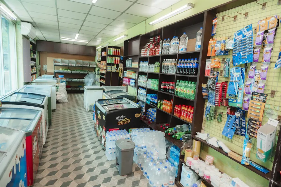 Chest freezers, cases of water and shelves of soft drinks