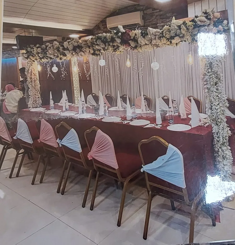 A meeting room set with a long table