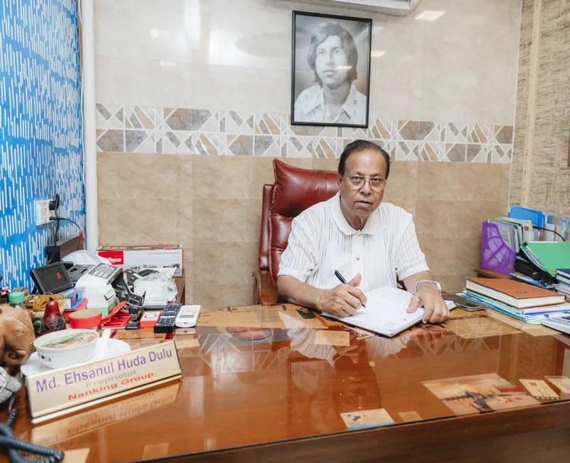 Md. Ehsanul Huda Dulu, proprietor, at his desk